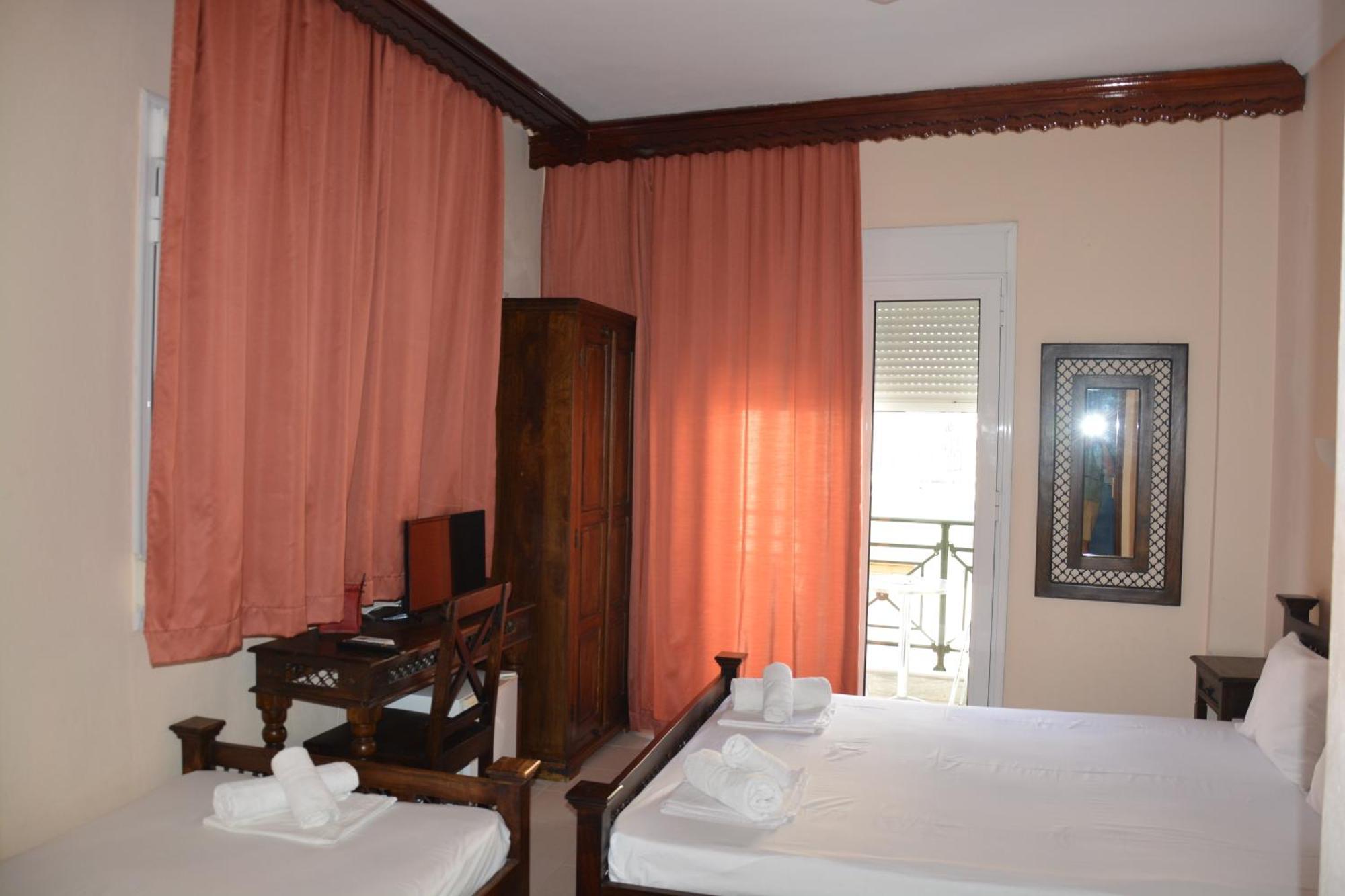 Dionyssos Hotel Лименас Екстериор снимка